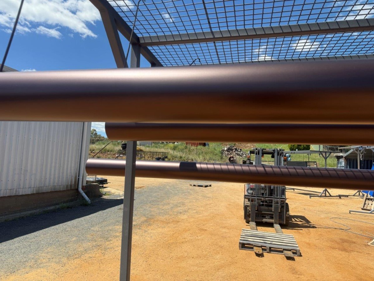 Powder Coated Shade Sail Posts in Burnished Copper | EPC Coatings